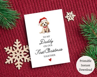 May include: A printable Christmas card featuring a cute dog wearing a Santa hat. The card reads "To my Daddy on our First Christmas Together" with a red heart.