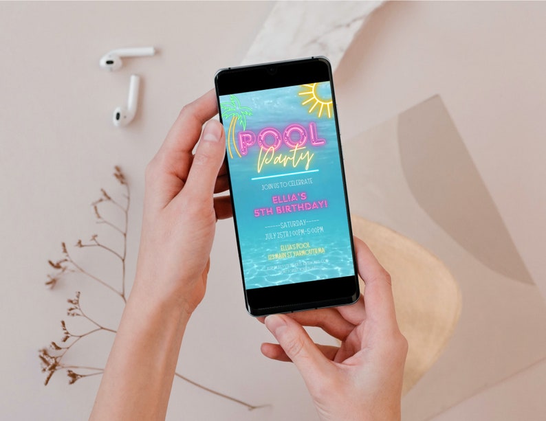 May include: A smartphone displaying a digital invitation for a pool party. The invitation features a neon pink and yellow "Pool Party" text with a sun and palm trees. The text reads "Join us to celebrate Ellia's 5th Birthday! Saturday, July 15th from 1-5:00PM.  RSVP to [email protected]"