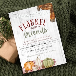 May include: An invitation to a "Flannel and Friends" Friendsgiving party on Saturday, 20 November 2022 at 6:00 PM. The invitation features a rustic wood background with a plaid scarf, pumpkins, and autumn foliage.