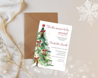 May include: A Christmas-themed bridal shower invitation featuring a watercolor Christmas tree design with red bows and a star. The invitation includes the text "Tis the season to be married" and event details.