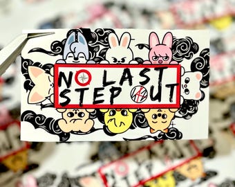 May include: A sticker with a red and white border and the text "No Last Step Out" in black. The sticker features cartoon animals, including a bunny, a bear, and a cat, with a black and white cloud background.