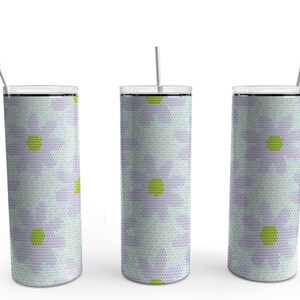 May include: Three tall, cylindrical tumblers with a floral pattern. The design features light purple and green flowers with yellow centers on a white background. Each tumbler has a silver lid and a white straw.