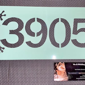 Metalen huisnummerbord met kikkers