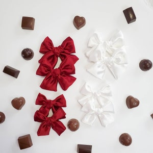 Christmas Hair Bows for Girls. Clip/Headband Bows. Red and White Bows.