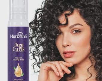 Espuma voluminizadora Herbishh Just Curls / Espuma de peinado antiencrespamiento y de fijación flexible (69 g)