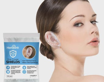 Herbishh 100 protectores desechables para oídos, gorros de ducha impermeables unisex para baño, protección para el cabello, protectores de oídos para ducha, tinte y uso en salones de belleza.