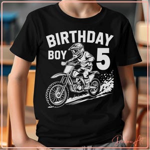 May include: Black t-shirt with a white graphic of a motocross rider and the words "BIRTHDAY BOY 5". The design features a detailed illustration of a rider on a dirt bike, with a number 5 on the right side.