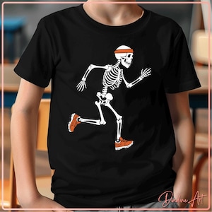 May include: Black t-shirt with a white skeleton running in orange sneakers and a headband. The skeleton is wearing a headband.