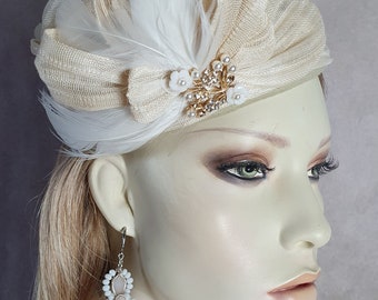 Handmade fascinator from beige felt with swan feathers and abaca silk, elegant ladies hat, pillbox hat, special occasions