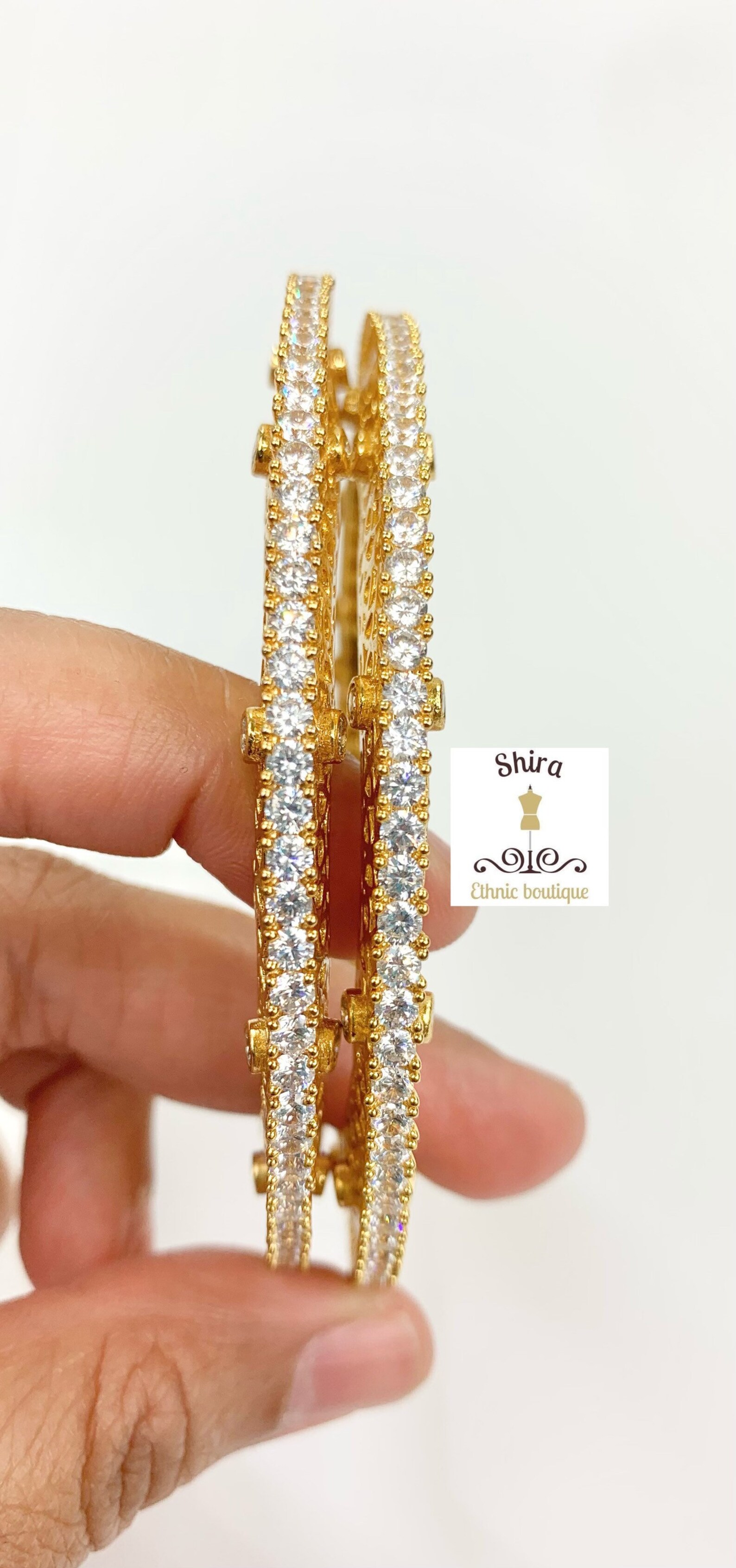 Pacheli designs in gold Clearance