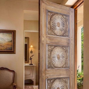 Custom Carved Wood Entry Door: Rustic Barn Style