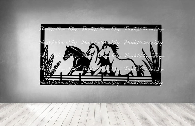 May include: Black silhouette of three horses running through a field with tall grass and a fence. The image is framed with a black border.