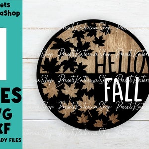 May include: A round wooden sign with black leaves and the text "HELLO FALL" in white letters.