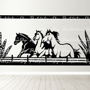 May include: Black silhouette of three horses running over a fence with tall grass on either side. The horses are in a line, with the horse in the back slightly behind the other two. The horses are running to the right.