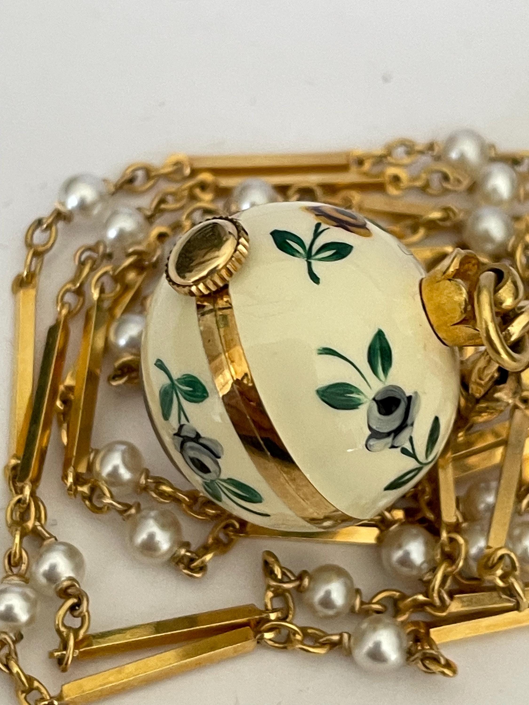 Bucherer pendant watch boasts an enamel flower bezel and a horses head design Ladies Vintage Bucherer Enameled Hand Painted Flowers  main image 4