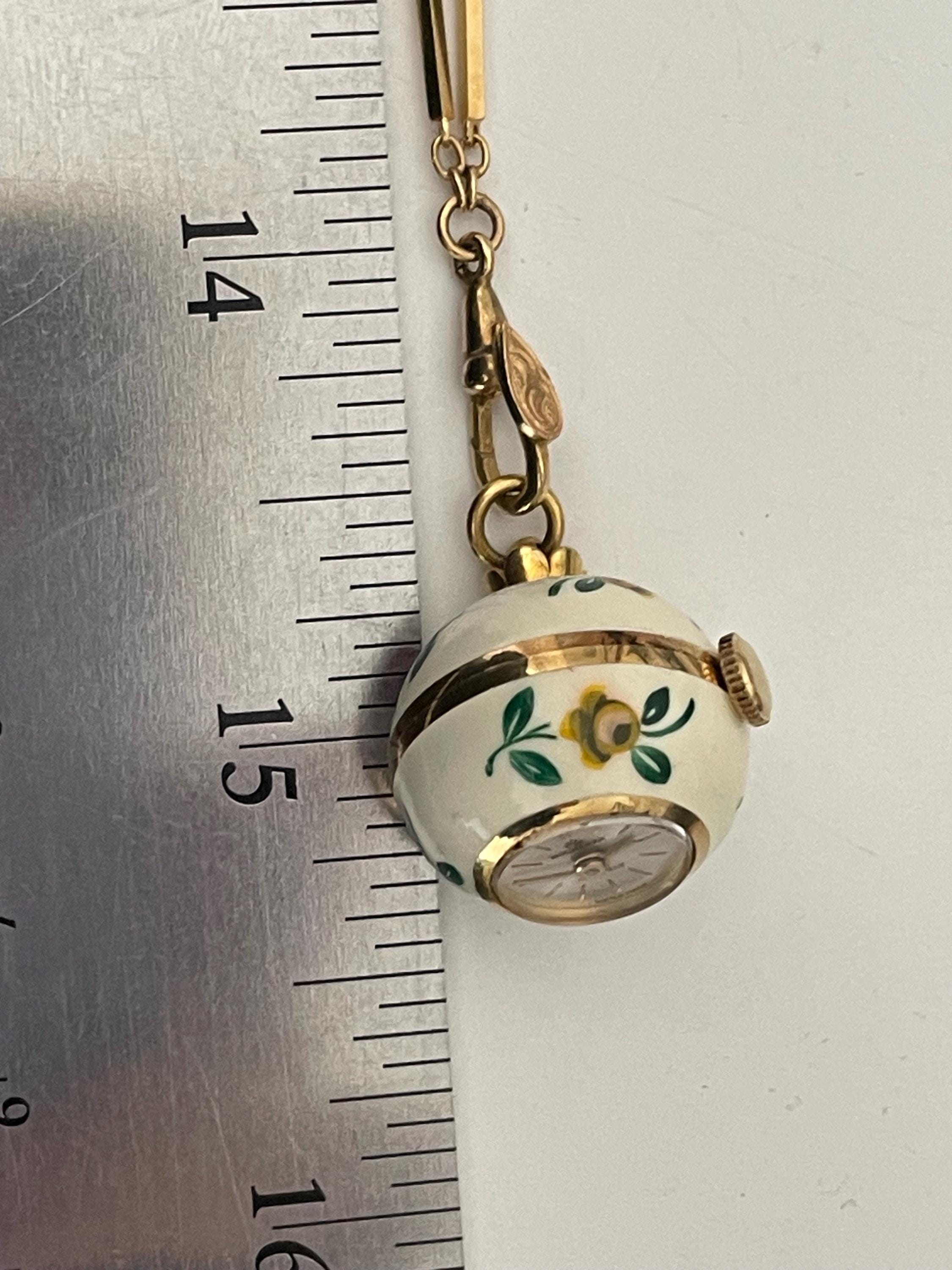 Bucherer pendant watch boasts an enamel flower bezel and a horses head design Ladies Vintage Bucherer Enameled Hand Painted Flowers  main image 3
