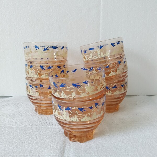 8 small pink tumblers. 1930s bluebird design