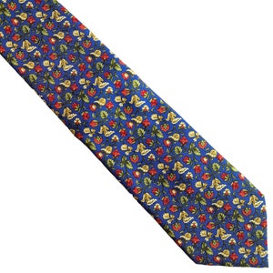 May include: A blue silk tie with a floral pattern in shades of red, yellow, and green.