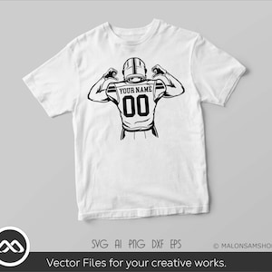May include: A white t-shirt with a black and white illustration of a football player in a pose. The player is wearing a jersey with the text "YOUR NAME" and the number "00".