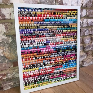 Abstract picture created from recycled magazines, multicolored rolls brighter