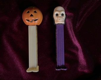 Vintage Skull and Pumpkin Pez Dispensers