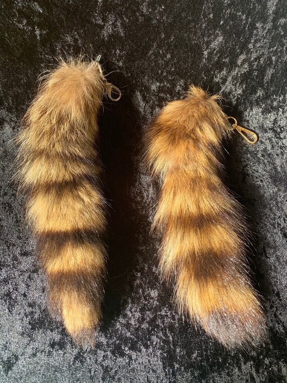 Raccoon tail keychains Etsy