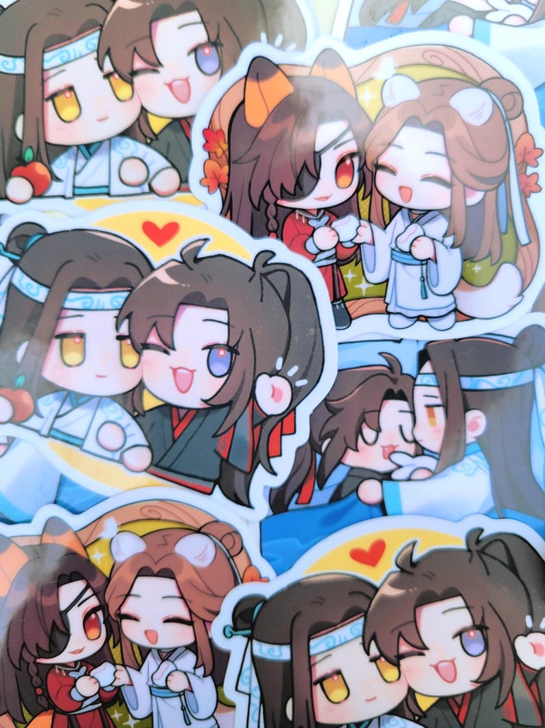 May include: A selection of vibrant stickers showcasing chibi-style illustrations of two characters. The characters have dark hair and wear traditional clothing in white, black, and red. Some stickers include a heart symbol. The stickers are suitable for various uses.