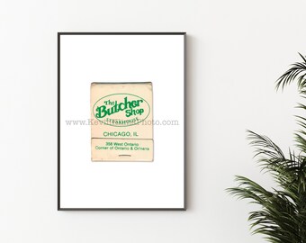 May include: A vintage matchbook for The Butcher Shop Steakhouse in Chicago, Illinois. The matchbook is white with green text and a green logo that says "The Butcher Shop Steakhouse". The address is 358 West Ontario, Corner of Ontario & Orleans.