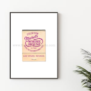 May include: A vintage matchbook cover with the text "Stolen from Mabel's Whore House" in purple lettering. The matchbook also includes the text "Las Vegas, Nevada" and "Where the customer comes first".