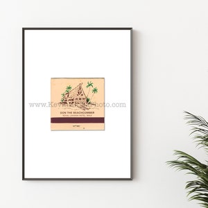 May include: A vintage matchbook cover with a brown and white illustration of a tropical hut with palm trees. The text on the matchbook reads "Don the Beachcomber Royal Lahaina Hotel, Maui."