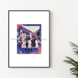 May include: A framed print with a colorful abstract background and a photo of a protest. The photo shows people holding signs that say "Black Lives Matter". The text "BLM" is printed at the bottom of the photo.