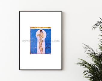 May include: A rectangular matchbox featuring a blue background with a central white keyhole shape containing a pin-up illustration. The text reads YES, I'm HOME and Phone Essex 5-0220. The matchbox has a worn, vintage texture with visible creases.