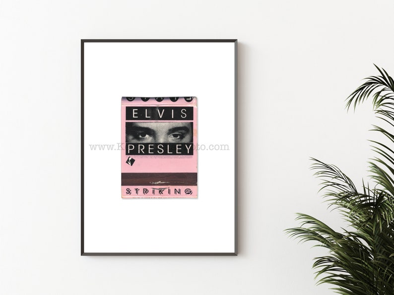 May include: A vintage matchbook with a pink background and black text that reads "ELVIS PRESLEY" with a black and white image of Elvis Presley's eyes. The bottom of the matchbook reads "STRIKING".