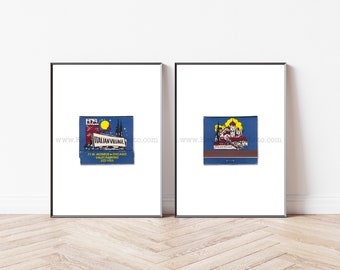 May include: Two framed vintage matchbook covers. The left cover is blue with a white moon and stars. It says "Italian Village" and "71 W. Monroe - Chicago - Valet Parking - 321-7003". The right cover is blue with a yellow sun and a red building. It says "Italian Village".