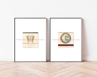 May include: Two framed vintage matchbook covers. The left cover features a gold crest with the text "The Brown Palace Hotel Denver" and the text "Denver's Celebrated Home". The right cover features a red circle with the text "Brown Palace Hotel" and a world map with the text "Around the World Renowned".