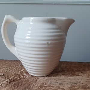 Heavy White Ribbed Pitcher