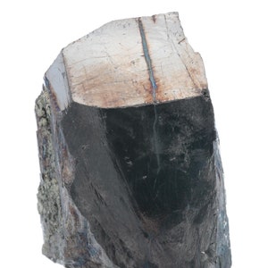 May include: A large, dark gray, metallic mineral specimen with a sharp, angular shape. The mineral has a smooth, polished surface and a few small, lighter gray inclusions.