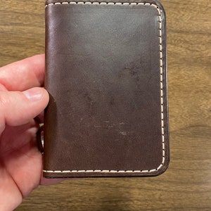 Cartera plegable vertical