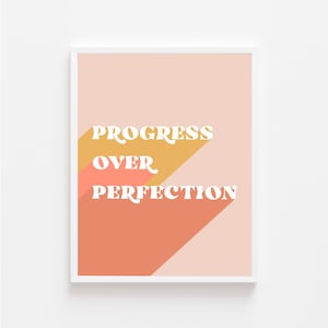 May include: A pink and peach background with a white graphic that reads "PROGRESS OVER PERFECTION" in a retro font.
