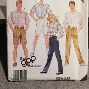 May include: A sewing pattern for a shirt and shorts from McCall's, featuring the Gap logo. The pattern is for sizes extra small to small, petite.