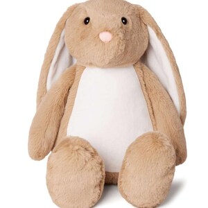 May include: A brown plush bunny with white fur on its belly and long floppy ears. The bunny is sitting with its legs crossed.