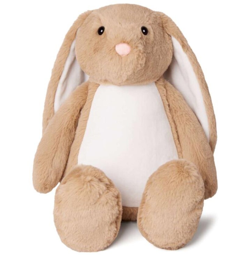 May include: A brown plush bunny with white fur on its belly and long floppy ears. The bunny is sitting with its legs crossed.