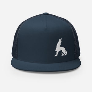 May include: A navy blue trucker hat with a white embroidered silhouette of a mythical creature on the front.