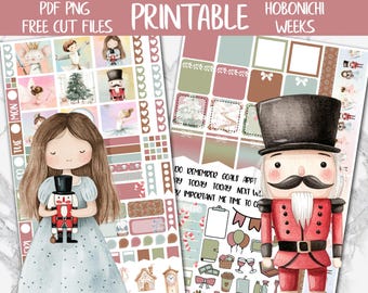 Peut inclure: Planche d'autocollants de planificateur imprimables sur le thème de Casse-Noisette. Les autocollants comprennent des illustrations d'une ballerine, d'un sapin de Noël et d'un soldat Casse-Noisette. Le texte "PDF PNG FREE CUT FILES PRINTABLE HOBONICHI WEEKS" est visible.