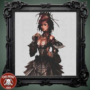 May include: A framed cross-stitch portrait of a woman in a gothic style dress. The woman has dark hair and is wearing a red hat. The frame is black and ornate. The logo "COOL GOTHIC STITCH" is in the lower left corner.