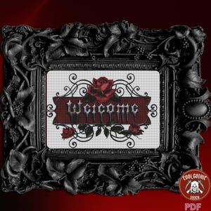 May include: Cross stitch pattern featuring a gothic welcome sign with red roses and black scrolling details. The pattern is framed in a black ornate frame.