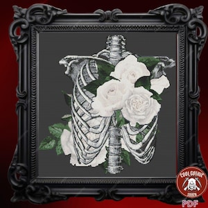 May include: A cross-stitch pattern featuring a white rose bouquet with a skeletal ribcage in the background. The pattern is framed in a black frame with a "Cool Gothic Stitch" logo in the bottom right corner.