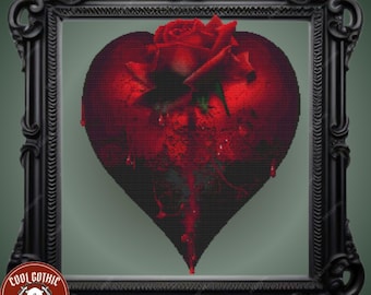 Puede incluir: Una rosa roja con espinas está incrustada en un corazón sangrante, goteando sangre. El corazón está rodeado por un marco negro.