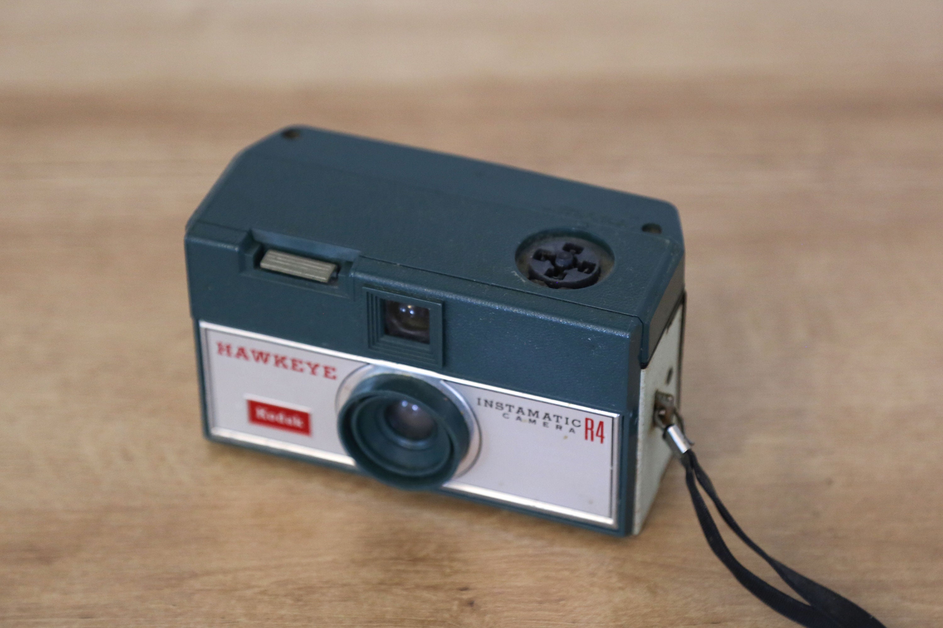 Vintage Kodak Hawkeye Instamatic R4 Camera in Green Forest picture