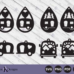 May include: A set of six black and white SVG cut files for crafting earrings and other projects. The designs feature a camper van with various details, including hearts, trees, and a mountain scene with a sun.